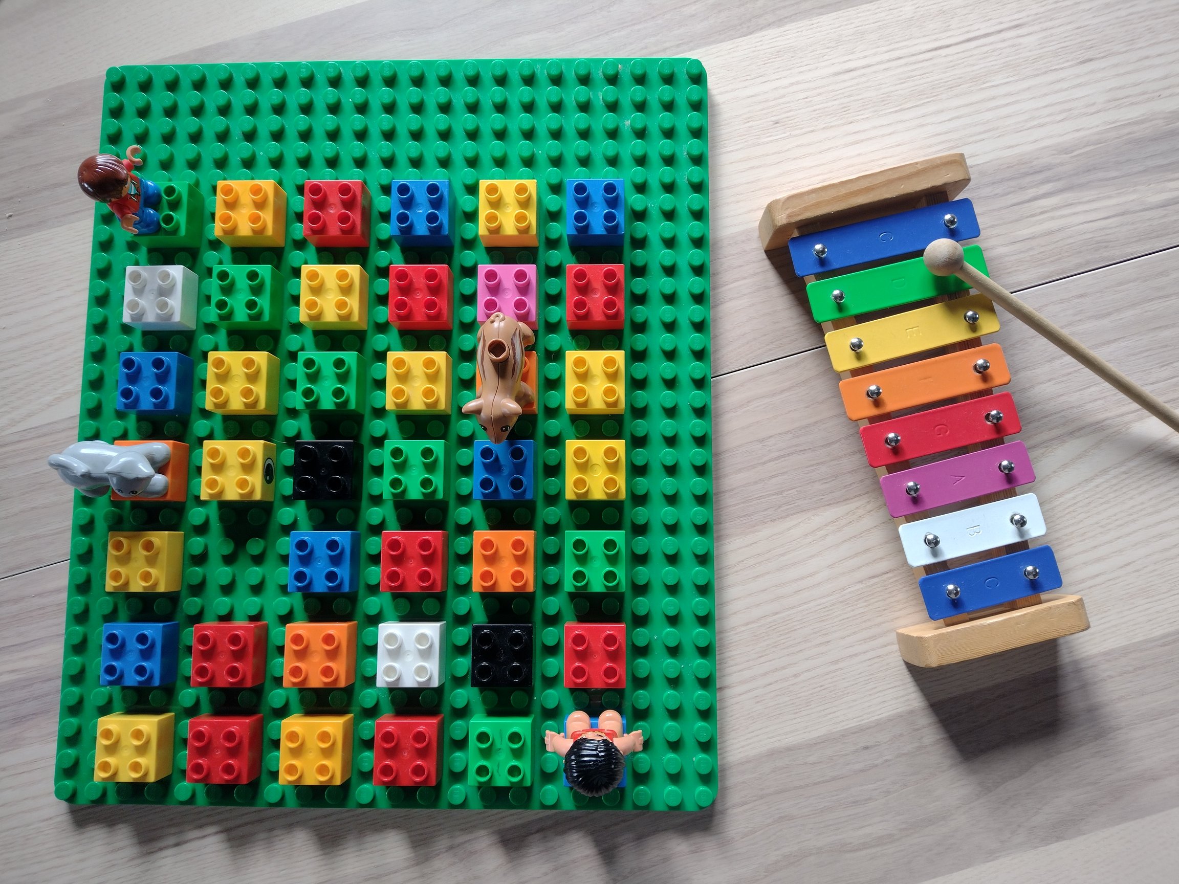 Play the glockenspiel to move the Lego figure